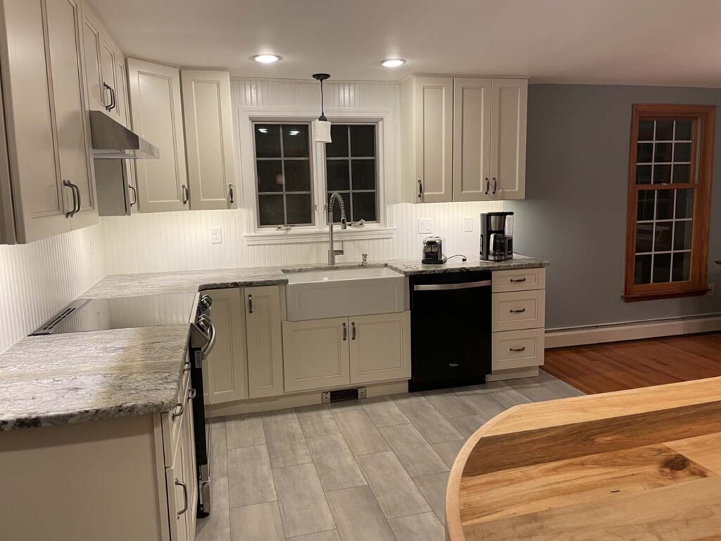 Open-concept kitchen renovation in Fife Heights home with quartz countertops