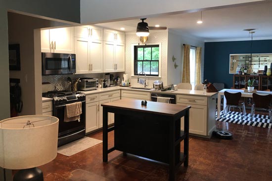 Modern kitchen remodel in Ruston, WA with white cabinets and quartz countertops
